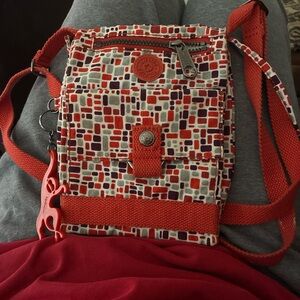 Colorful Patterned Crossbody Bag with Red Accents